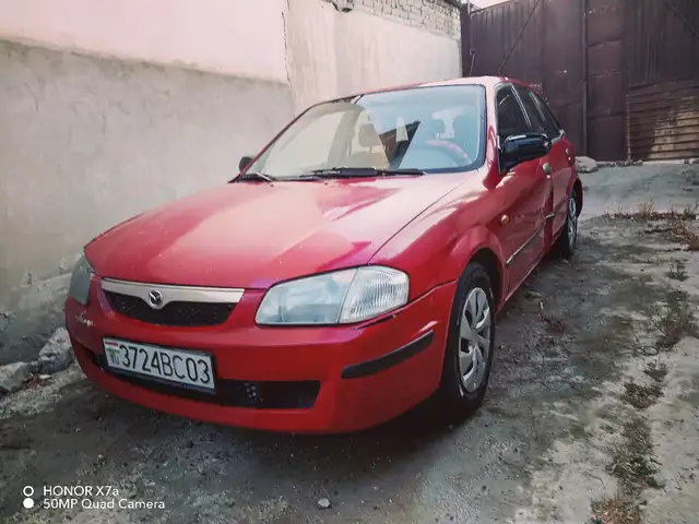 Mazda 323 1999 - Выбор фото 2