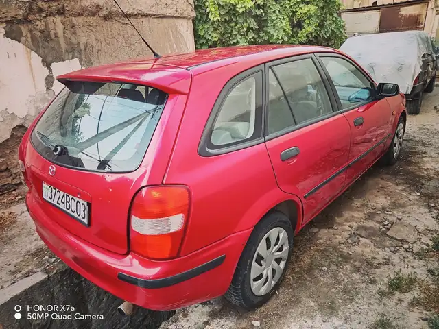 Mazda 323 1999 - Выбор фото 4