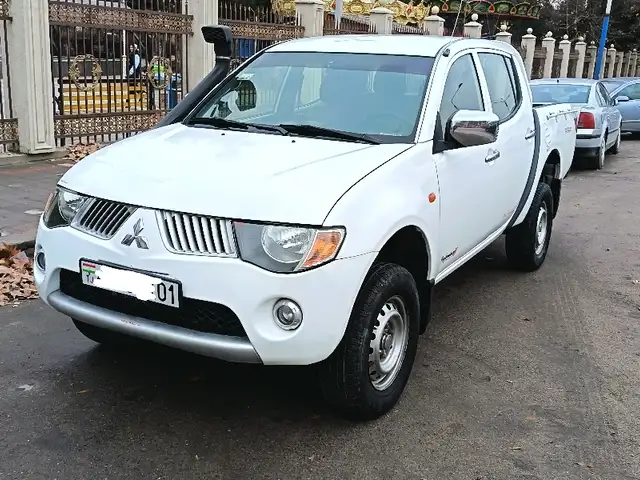 Mitsubishi L200 2009 - Выбор фото 1