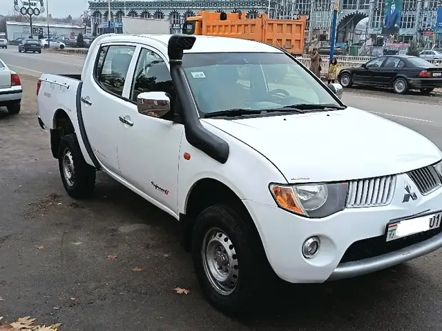 Mitsubishi L200 2009 - Выбор фото 2