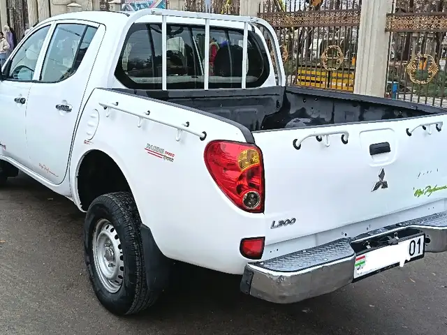 Mitsubishi L200 2009 - Выбор фото 4