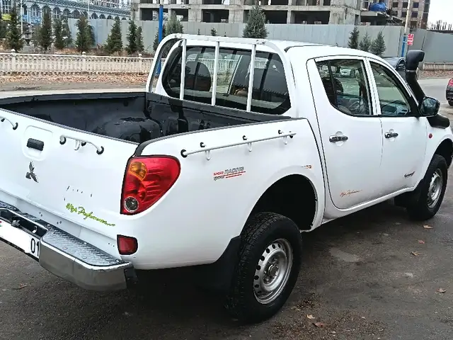 Mitsubishi L200 2009 - Выбор фото 5