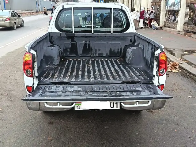 Mitsubishi L200 2009 - Выбор фото 7