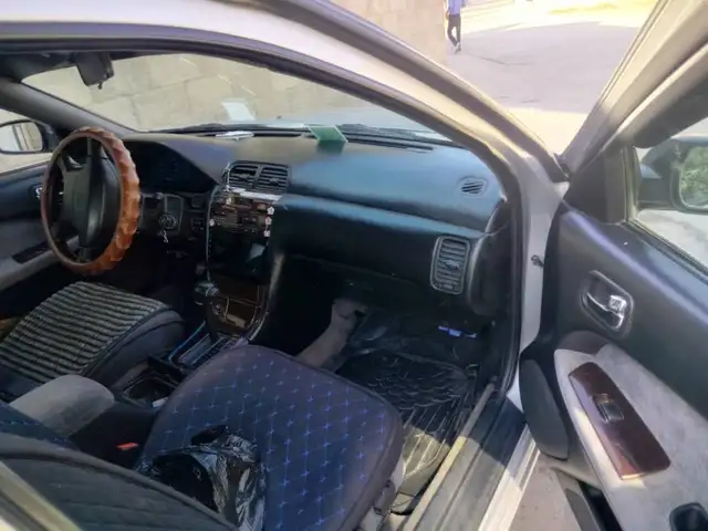 Nissan Cefiro 1998 - Выбор фото 4