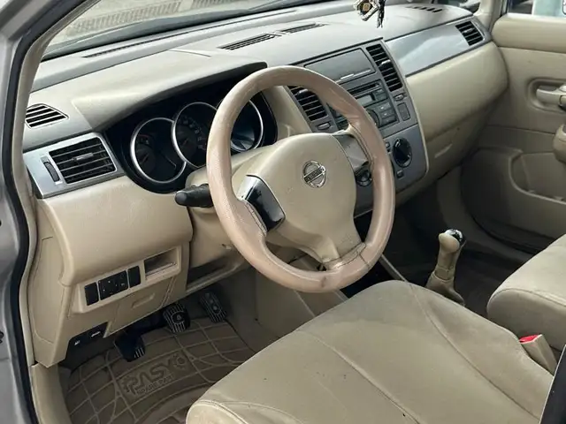 Nissan Tiida 2006 - Выбор фото 7